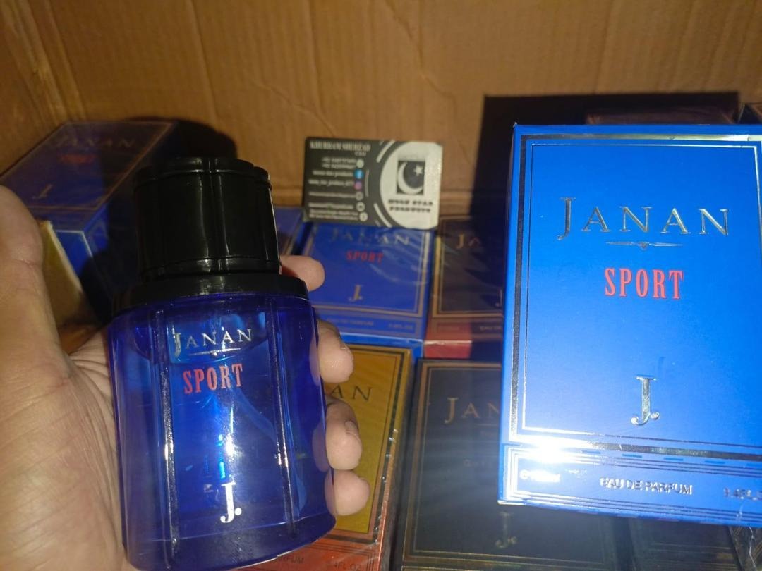 Janan Sport 100ML perfume bottle with Chypre, Amber, Woody, Citrusy, and Musky fragrance notes.