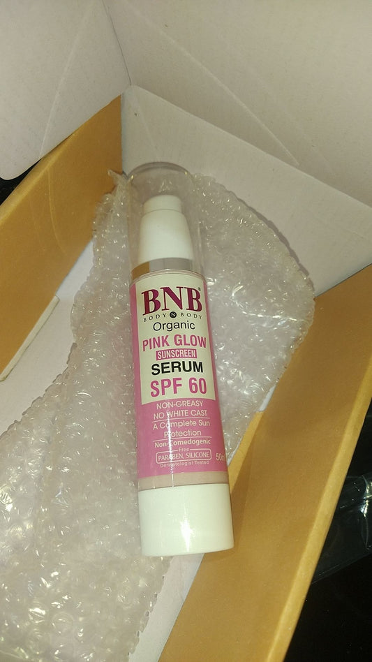 BNB Pink Glow SPF 60 Serum 50ml bottle with sun protection and skin radiance.

